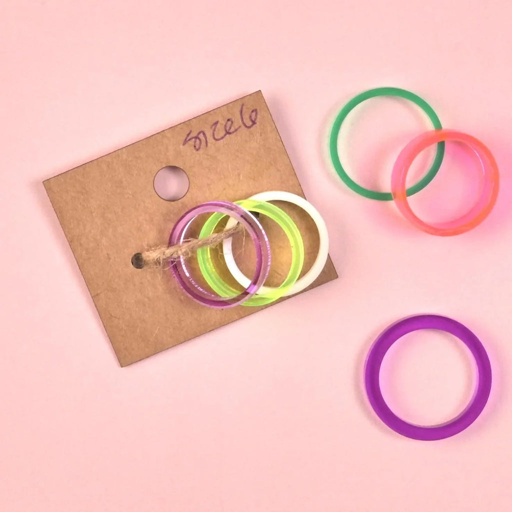 Colorful acrylic jewelry including various rings