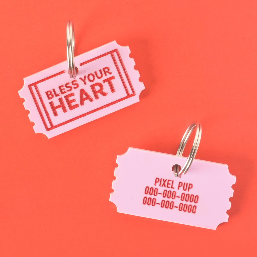Bless Your Heart acrylic pet ID tag with red ticket design on front and custom engraved pet name and phone number on the back.