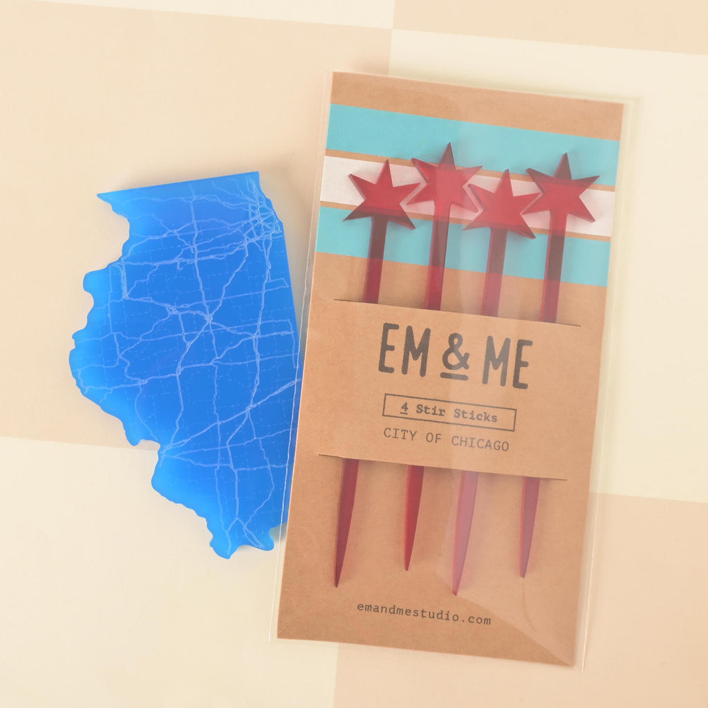 Set of four red acrylic star drink stir sticks packaged with a blue Illinois state-shaped coaster, inspired by the Chicago flag, displayed on a neutral background.