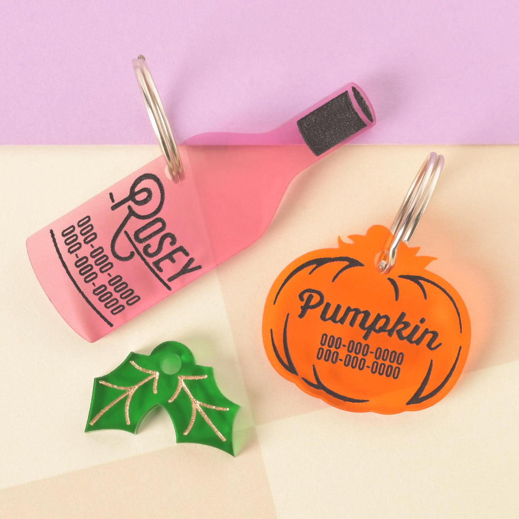 Fall themed personalized pet ID tags with wine bottle with the name "Rosey" Pumpkin tag and a holly charm mini