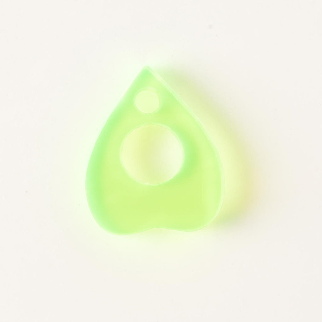 fluorescent green ouija planchet-shaped pet mini charm add on. on solid white background