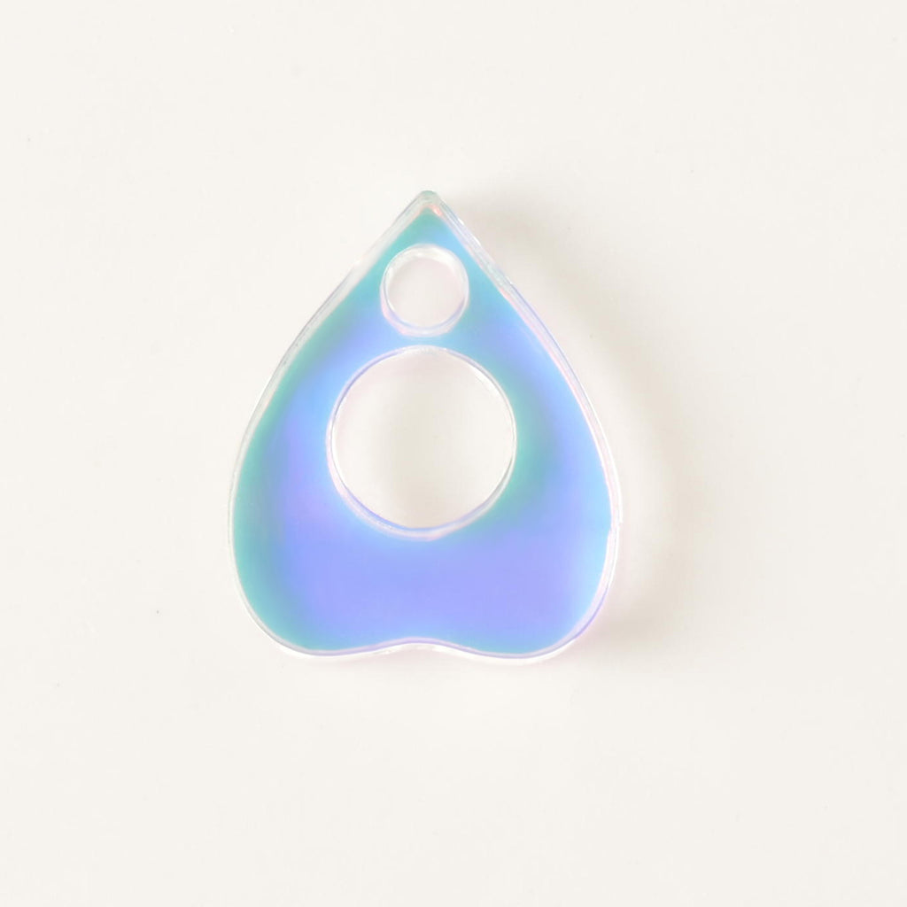 iridescent ouija planchet-shaped pet mini charm add on. on solid white background