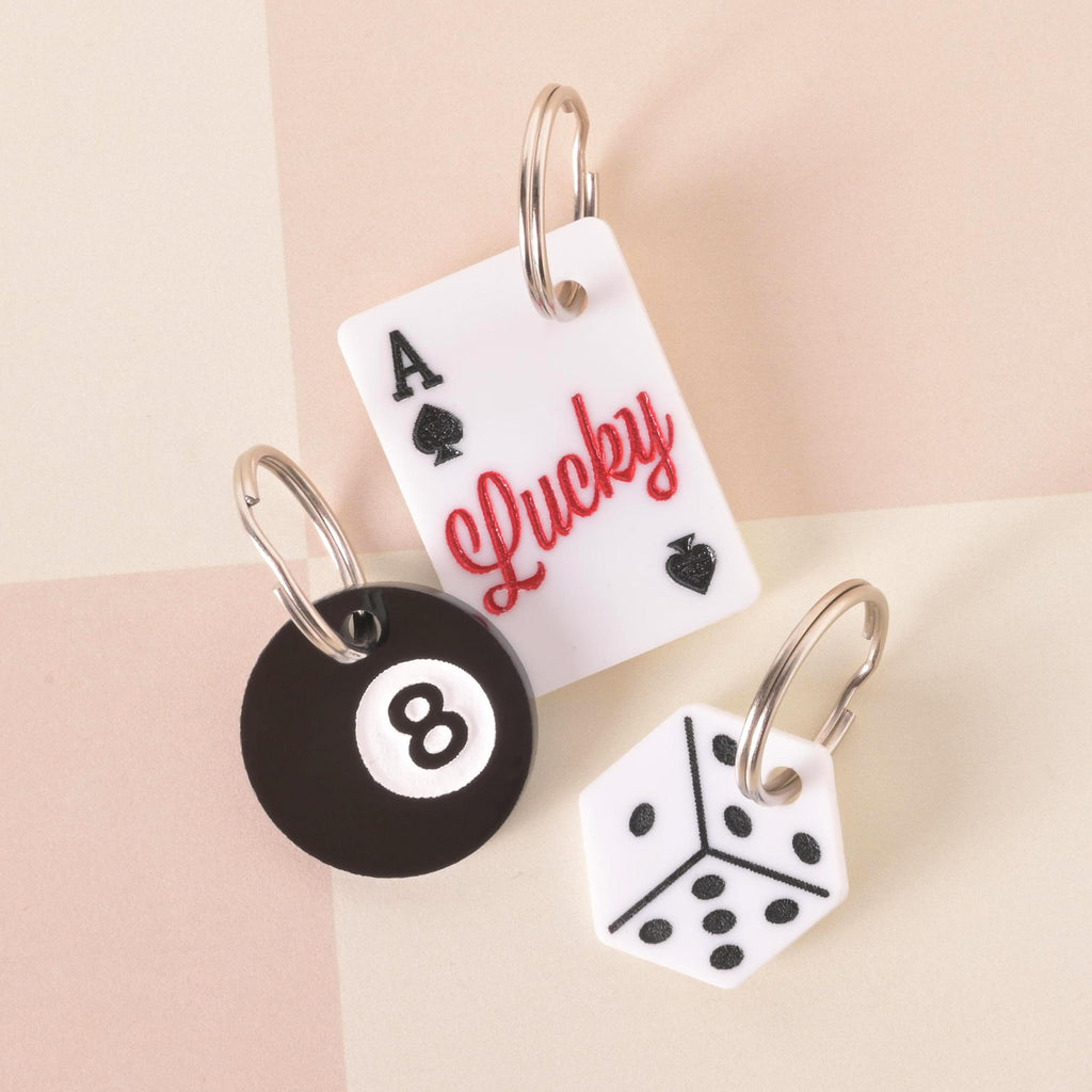 Set of lucky-themed pet ID tags featuring an Ace of Spades card with ‘Lucky,’ a Dice, and an 8 Ball, customizable name tags for dogs and cats.