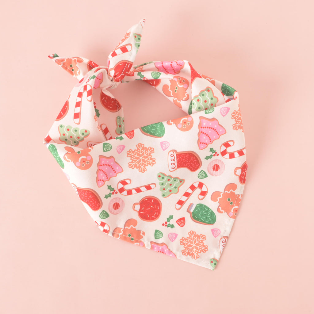 Festive Christmas dog bandana with gingerbread cookies, candy canes, and holiday designs – perfect holiday pet accessory