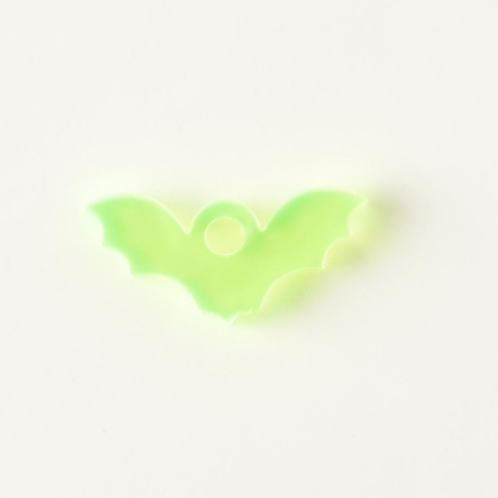 fluorescent green bat-shaped seasonal mini charm for pet ID tags on solid white background