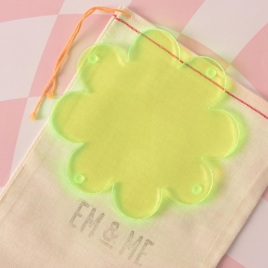 Oversized flower shaped coaster or trivet, fluorescent green, fluorescent pink and opaque lavender