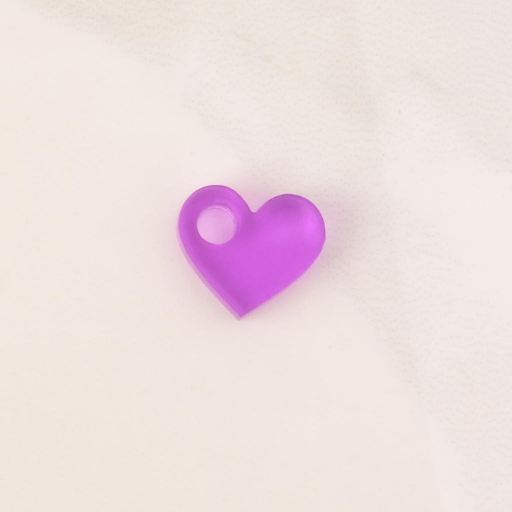 purple tiny heart mini charm on solid white background