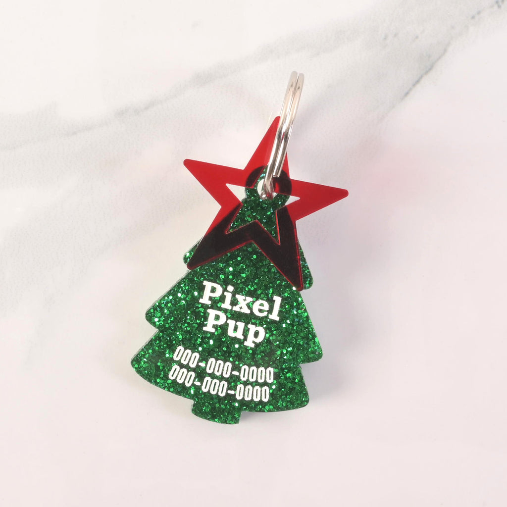 Green glitter Christmas tree-shaped dog tag with red star topper and custom name Pixel Pup – festive acrylic pet ID tag for the holidays