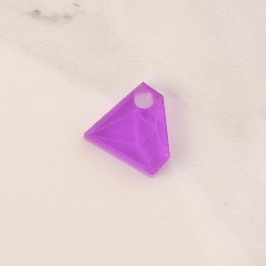 purple acrylic diamond-shaped mini charm with hole on solid white background