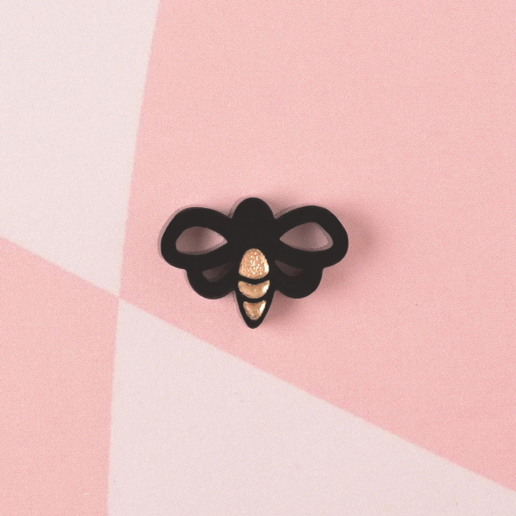 close up of a black Bee-shaped , Seasonal Mini, Tiny Honey Bee Accessory for Pet ID Tag, Cats and Dogs Add-on Charm