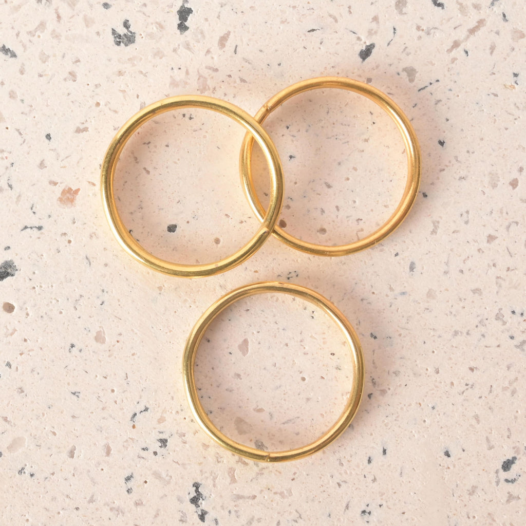 Extra Split Rings, Set of 3, available in silver or gold, Round Split Key Ring Connectors on stone surface 